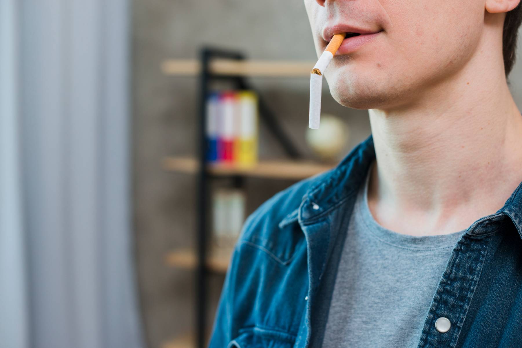portrait-young-man-carrying-broken-cigarette-mouth(1).jpg