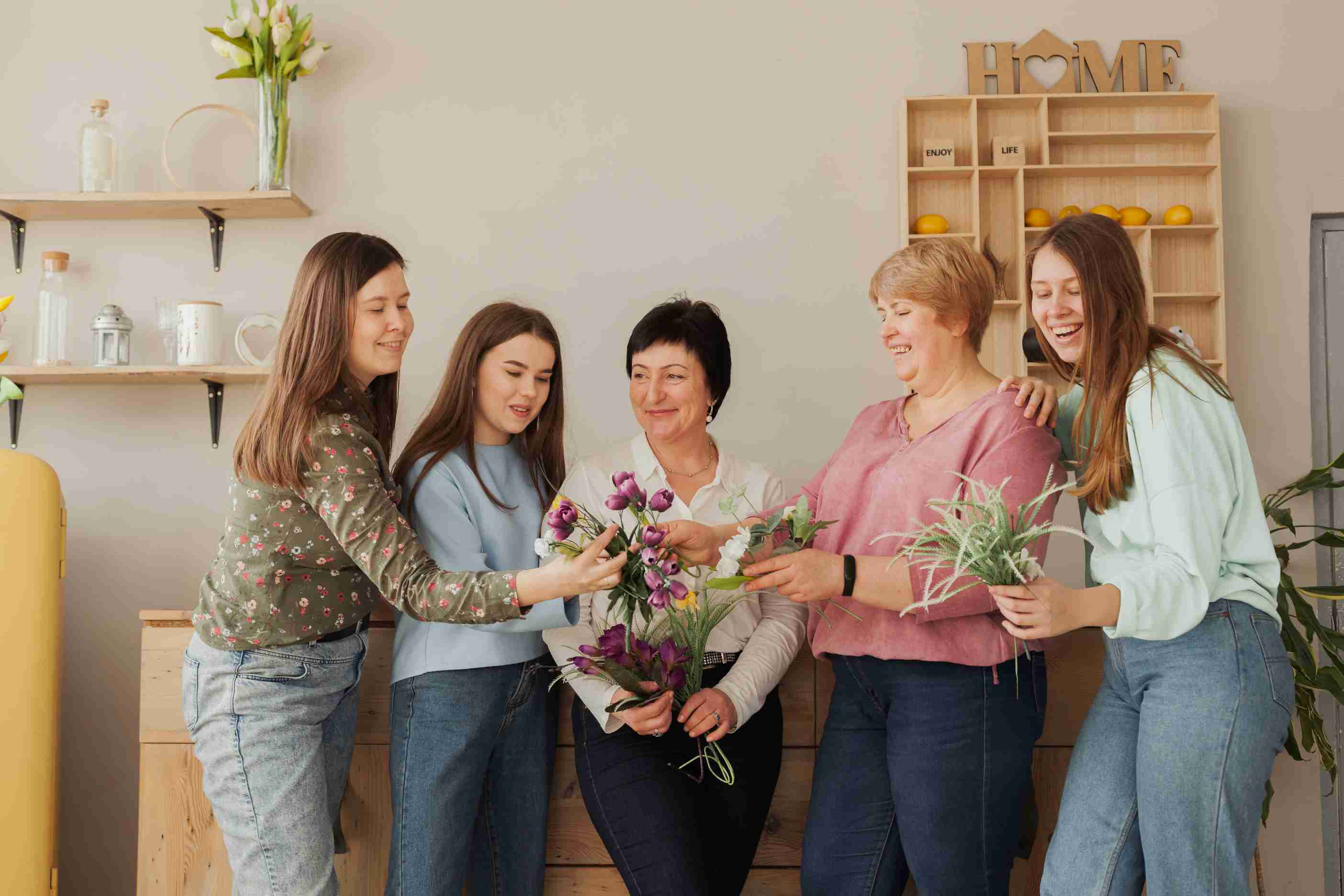 women-all-ages-looking-flowers.jpg