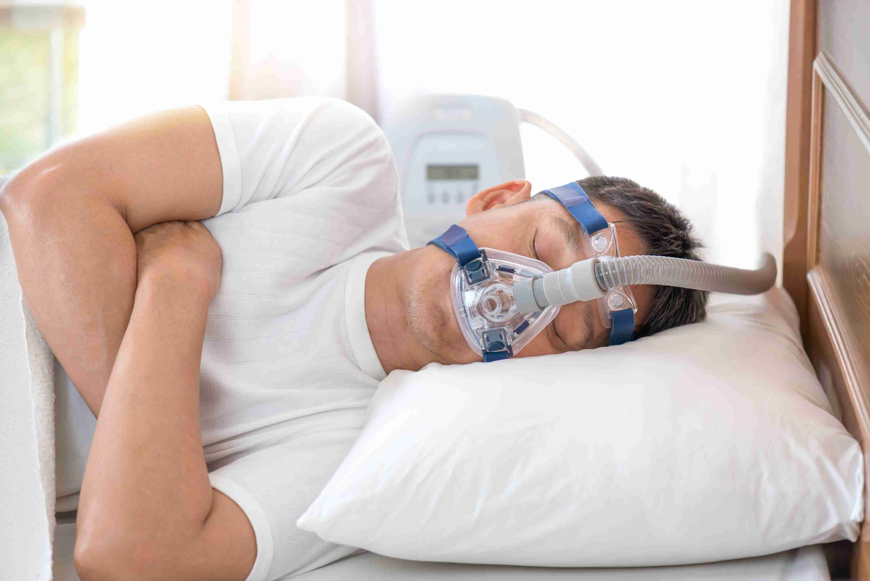 man-sleeping-bed-home.jpg