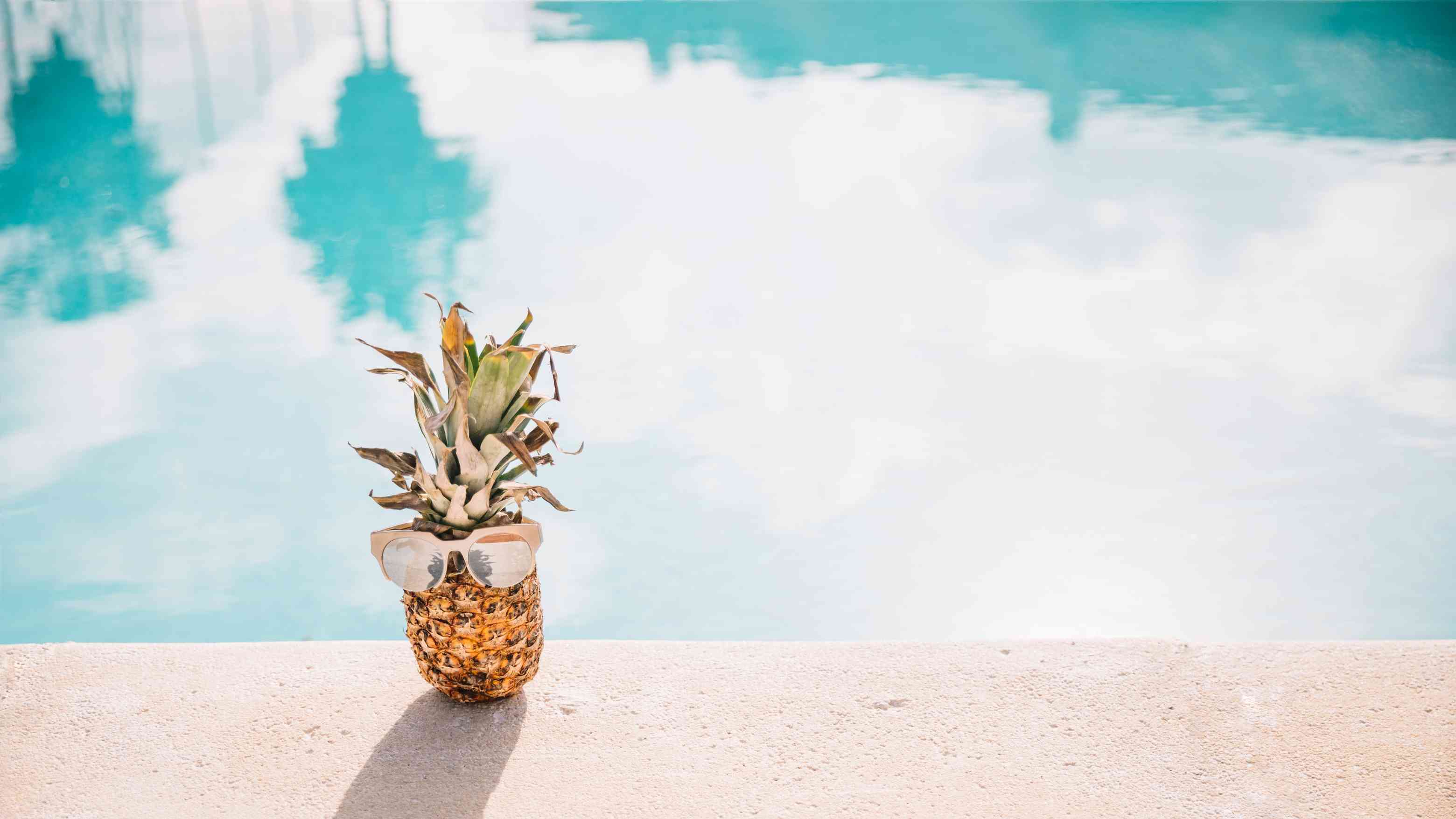summer-pool-concept-with-pineapple.jpg