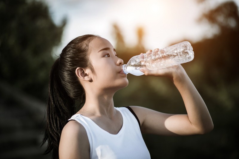 beautiful-young-fitness-woman-drinking-water-after-running-exercise.jpg
